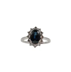 Bague or blanc carats sertie d'un saphir et de diamants naturels