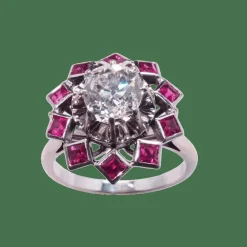 Bague or blanc diamant entouré de rubis