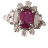 Bague or blanc, rubis fin au centre et entourage diamants Princesse