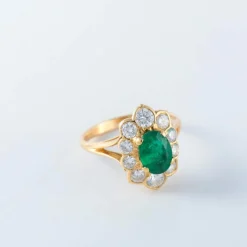 Bague or, diamants et émeraude