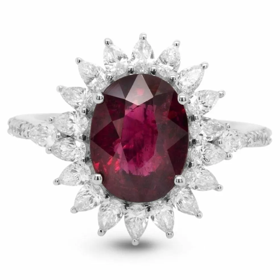 Bague or gris rubis diamants
