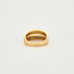 Bague or jaune 18 carats sertie de diamants et saphir