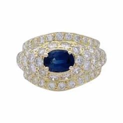 Bague or jaune, diamants et saphir.