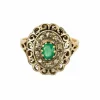 Bague or jaune et argent, centrée d'une émeraude