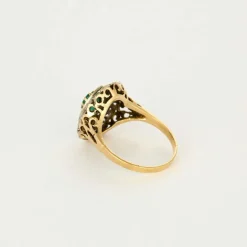 Bague or jaune et argent, centrée d'une émeraude