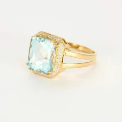 Bague or jaune et gris, diamants et aigue marine