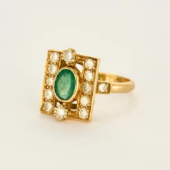 Bague or jaune, émeraude et diamants