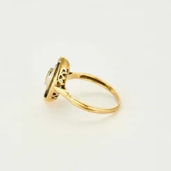 Bague or jaune, émeraude et diamants