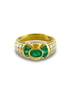 Bague or jaune émeraudes et diamants