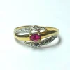 Bague or jaune, or gris et rubis
