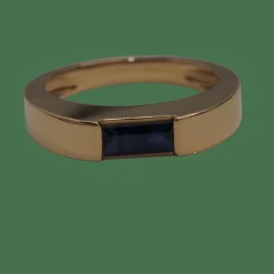 Bague or jaune, saphir baguette