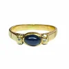 Bague or jaune, saphir cabochon et diamants