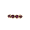 Bague or rose sertie de rubis roses