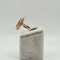 Bague or rose sertie d'une pierre rose