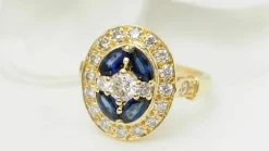 Bague ovale en or jaune, saphirs navette et diamants