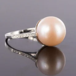 Bague perle de culture rose et diamants