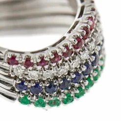 Bague Riviera avec émeraudes, saphirs, rubis et diamants