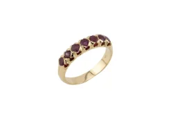 Bague rivière en or jaune avec rubis