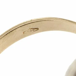 Bague ronde en or jaune avec diamants
