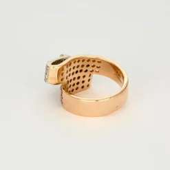 Bague ruban or rose, émeraude et saphirs roses