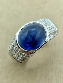 Bague saphir cabochon or blanc et diamants