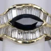 Bague saphir Marquise et diamants baguette en or jaune
