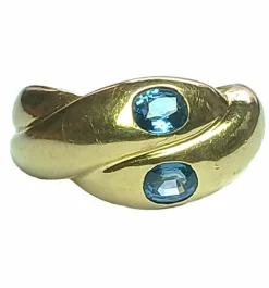Bague serpentine ornée de deux saphirs bleu ciel