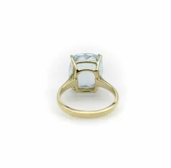 Bague Signature en or 14 carats et topaze bleu clair 6 carats
