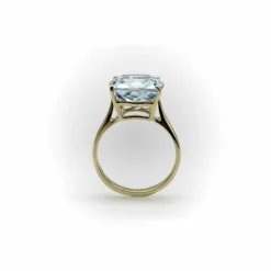 Bague Signature en or 14 carats et topaze bleu clair 6 carats