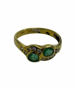 Bague sinueuse avec émeraudes et diamants