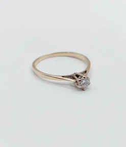 Bague solitaire art déco or blanc ornée d'un diamant taille brillant