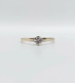 Bague solitaire art déco or blanc ornée d'un diamant taille brillant