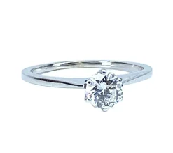 Bague solitaire en or blanc et diamant
