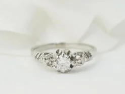 Bague solitaire en or blanc et platine, diamant 0,23ct