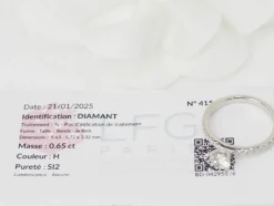 Bague solitaire en or blanc et diamants 0.65ct