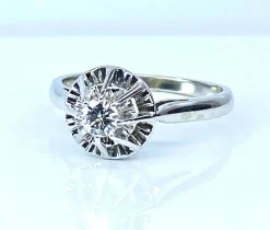 Bague solitaire en or et platine, diamant