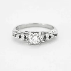 Bague solitaire en or gris