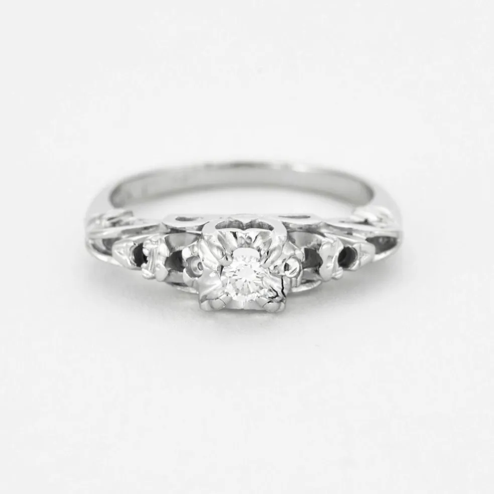 Bague solitaire en or gris