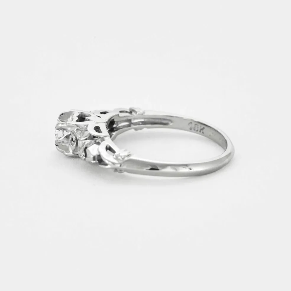 Bague solitaire en or gris