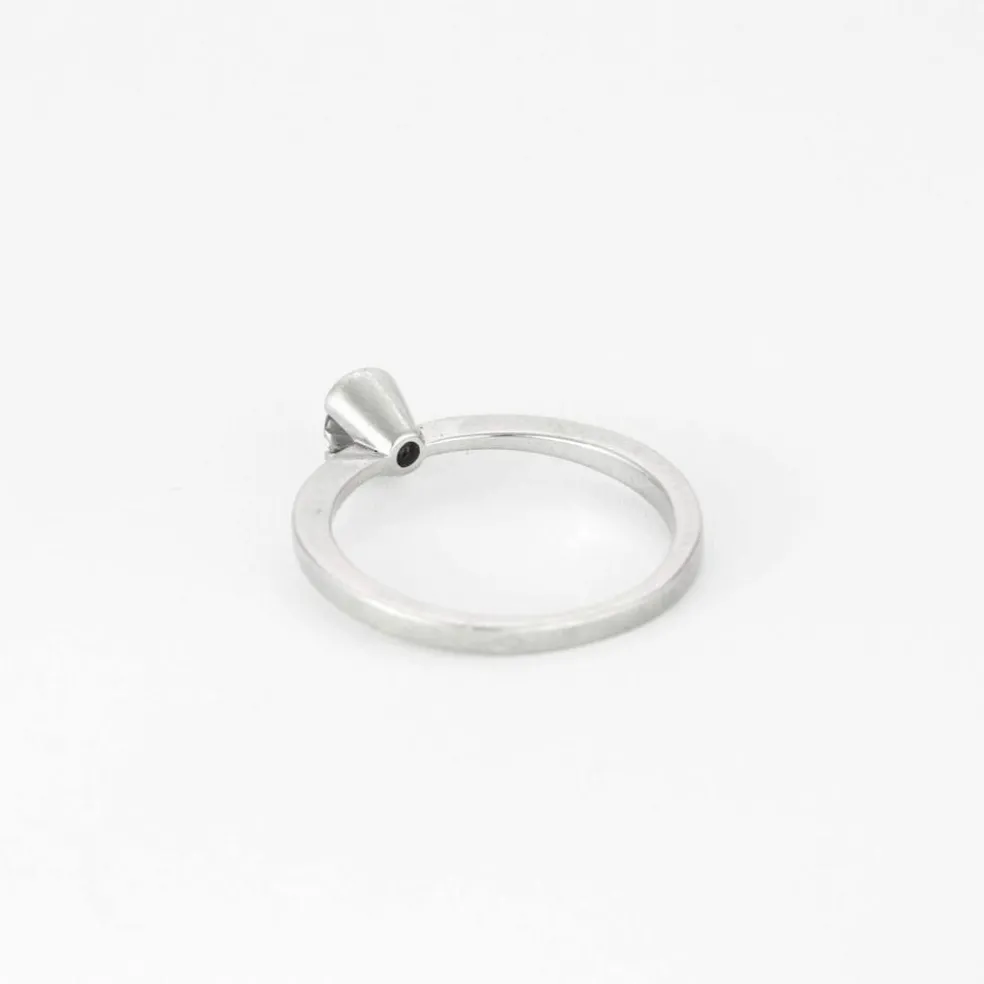 Bague solitaire en or gris et diamant