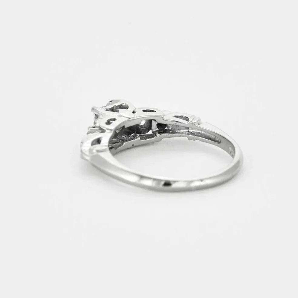 Bague solitaire en or gris