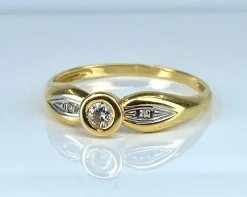 Bague solitaire en or jaune et diamants