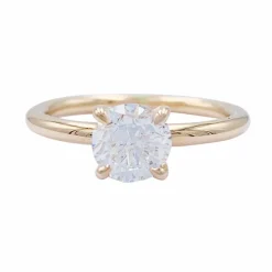 Bague solitaire en or rose, diamant 1 carat.