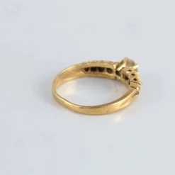 Bague Solitaire épaulé, 9 Diamants