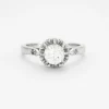 Bague solitaire platine, or gris et diamant.