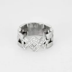 Bague souple, or blanc et diamants