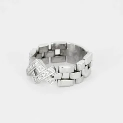 Bague souple, or blanc et diamants