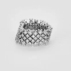 Bague souple, or gris et diamants