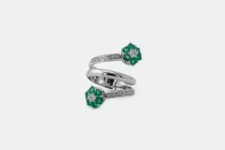 Bague spirale avec diamants et pierres vertes