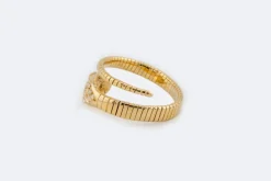 Bague spirale serpent en or jaune avec émeraudes et diamants